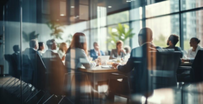 Group of business people having a meeting or brainstorming in a boardroom Group of business people having a meeting or brainstorming in a boardroom.